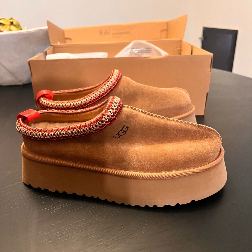 Ugg tazz slippers- never worn, in box! Too big for me.